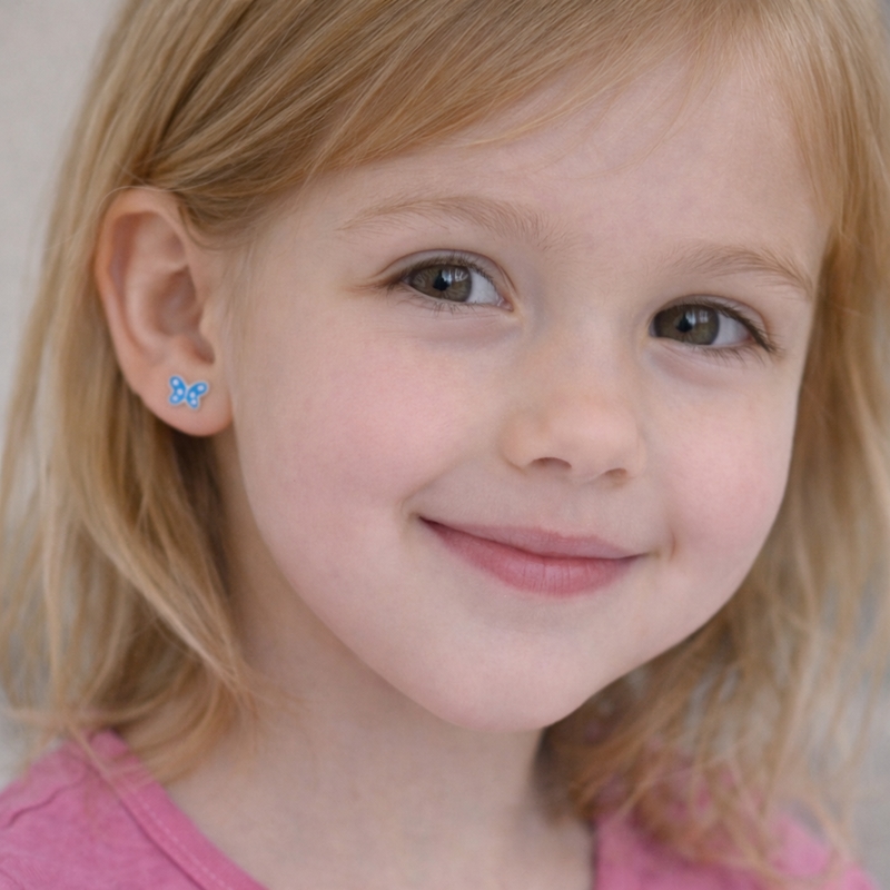 Boucles d’oreilles Papillon bleu Enfant Argent portées