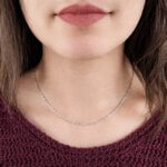 Chaîne Femme Singapour Argent 1.8 mm : éclat torsadé et élégance, portée