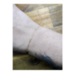 Bracelet Or jaune Infini ROBBEZ MASSON, porté